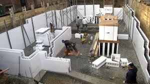 Foundation forms being set for concrete pour