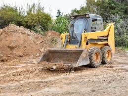 Skid steer loader on construction site